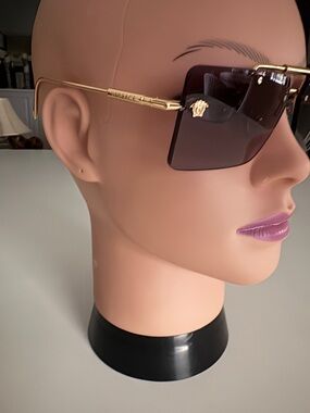 Versace Gold Frame Sunglasses with Dark purple lenses